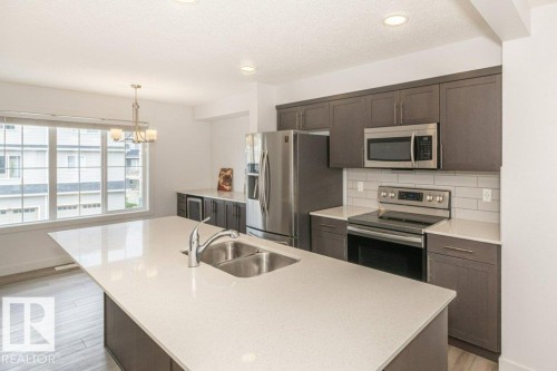 838 Daniels Way, Edmonton, AB - Indoor Photo Showing Kitchen With Double Sink