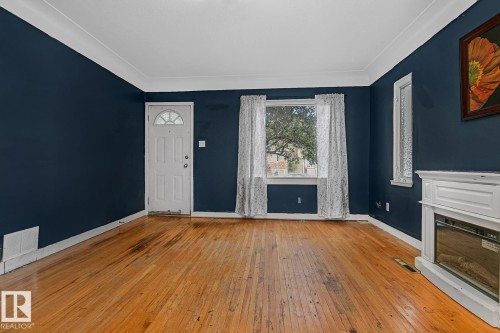 9221 110 Avenue, Edmonton, AB - Indoor With Fireplace