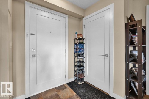Foyer with baseboards - 305 5029 Edgemont Boulevard, Edmonton, AB - Indoor Photo Showing Other Room
