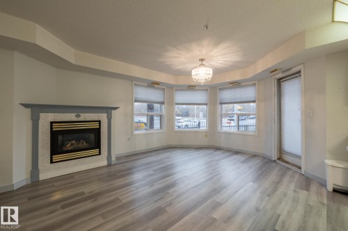 106 6703 172 Street, Edmonton, AB - Indoor Photo Showing Living Room With Fireplace