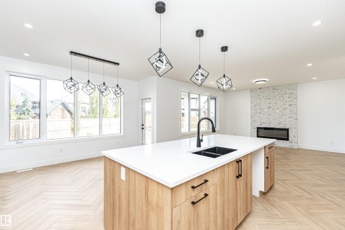 3221 Pelerin Crescent, Beaumont, AB - Indoor Photo Showing Kitchen With Double Sink With Upgraded Kitchen