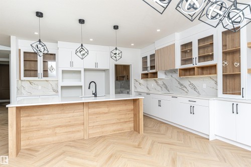 3221 Pelerin Crescent, Beaumont, AB - Indoor Photo Showing Kitchen With Upgraded Kitchen