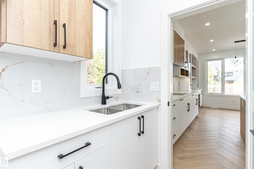 3221 Pelerin Crescent, Beaumont, AB - Indoor Photo Showing Kitchen With Double Sink With Upgraded Kitchen