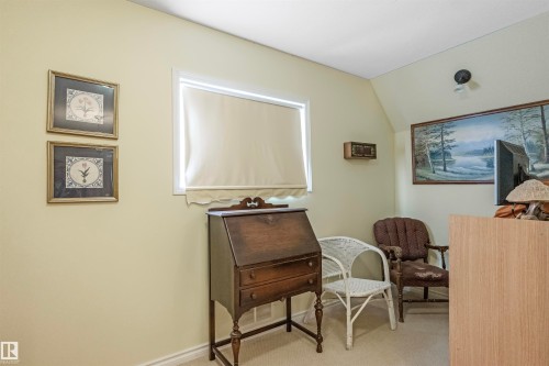 Living area with light colored carpet and lofted ceiling - 218 58532 Range Road 113, Rural St. Paul County, AB - Indoor