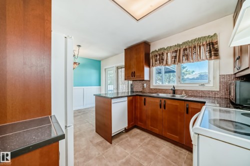 6308 144A Avenue, Edmonton, AB - Indoor Photo Showing Kitchen With Double Sink