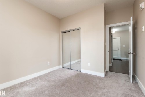 140 6079 Maynard Way, Edmonton, AB - Indoor Photo Showing Other Room