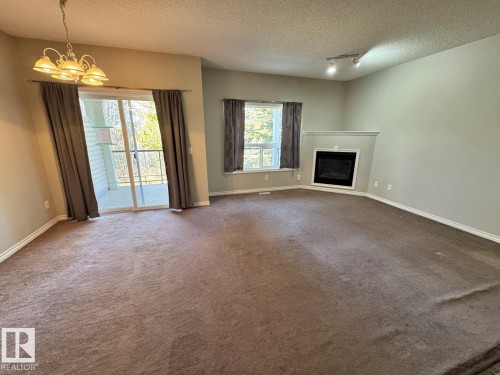 103 3010 33 Avenue, Edmonton, AB - Indoor With Fireplace