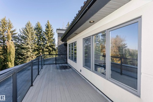 Deck with view of wooded area - 19103 Ellerslie Road Sw, Edmonton, AB - Outdoor With Exterior