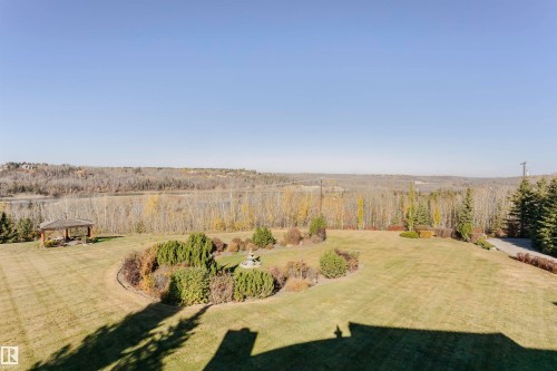 View of grassy yard featuring a gazebo - 19103 Ellerslie Road Sw, Edmonton, AB - Outdoor With View