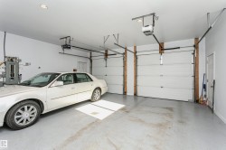 Garage with electric panel and a garage door opener - 