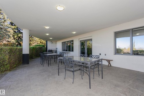 View of patio featuring outdoor dining area - 19103 Ellerslie Road Sw, Edmonton, AB - Outdoor With Deck Patio Veranda