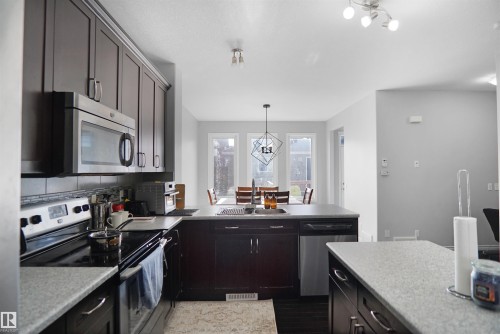 4203 Orchards Drive, Edmonton, AB - Indoor Photo Showing Kitchen With Stainless Steel Kitchen With Double Sink