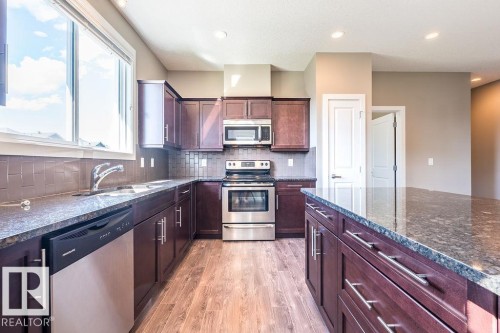1080 Watt Promenade, Edmonton, AB - Indoor Photo Showing Kitchen With Stainless Steel Kitchen With Double Sink