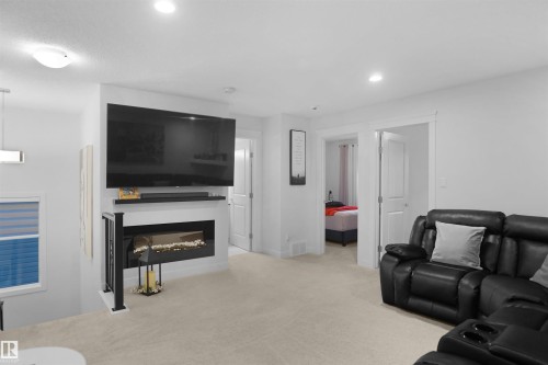 4112 171 Avenue, Edmonton, AB - Indoor Photo Showing Other Room With Fireplace