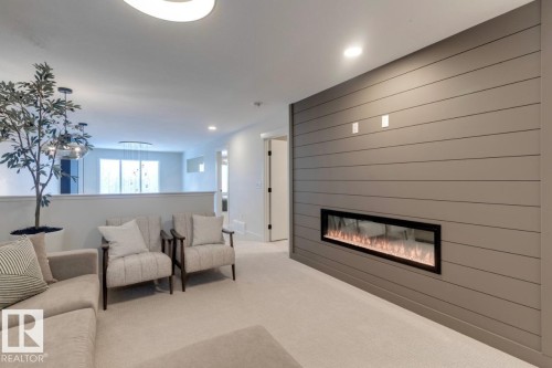 3280 Chernowski Way, Edmonton, AB - Indoor Photo Showing Living Room With Fireplace
