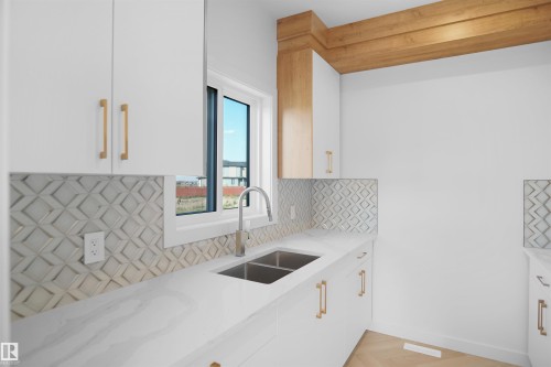 11 Trill Point(E), Spruce Grove, AB - Indoor Photo Showing Kitchen With Double Sink