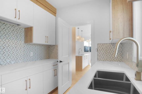 11 Trill Point(E), Spruce Grove, AB - Indoor Photo Showing Kitchen With Double Sink