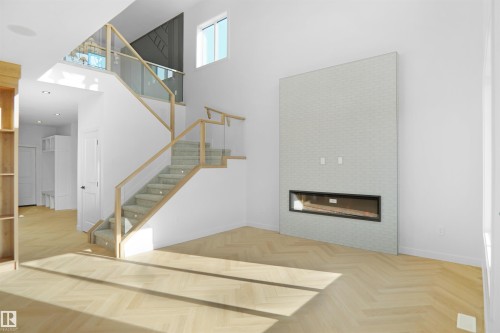 11 Trill Point(E), Spruce Grove, AB - Indoor Photo Showing Other Room With Fireplace