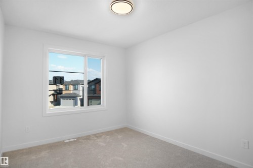 11 Trill Point(E), Spruce Grove, AB - Indoor Photo Showing Other Room
