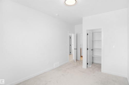 11 Trill Point(E), Spruce Grove, AB - Indoor Photo Showing Other Room