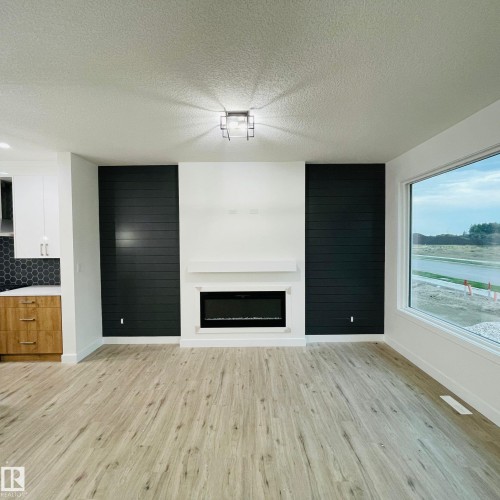Main 8082 Kiriak Link, Edmonton, AB - Indoor With Fireplace