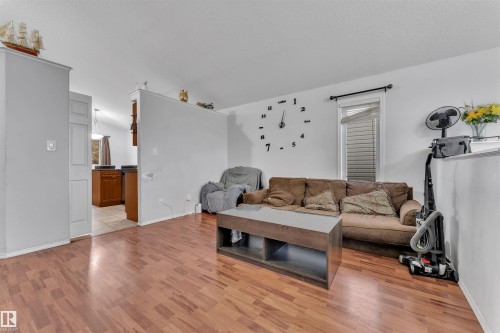3307 24 Av Nw, Edmonton, AB - Indoor Photo Showing Living Room