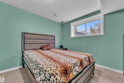 3307 24 Av Nw, Edmonton, AB - Indoor Photo Showing Bedroom