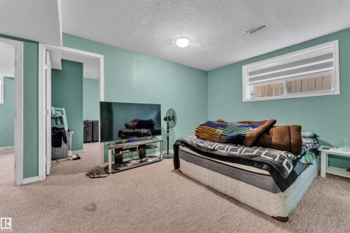 3307 24 Av Nw, Edmonton, AB - Indoor Photo Showing Bedroom