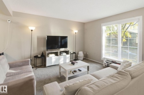 10718 122 Street, Edmonton, AB - Indoor Photo Showing Living Room