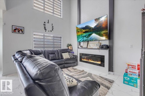 1325 20 Street, Edmonton, AB - Indoor Photo Showing Living Room With Fireplace