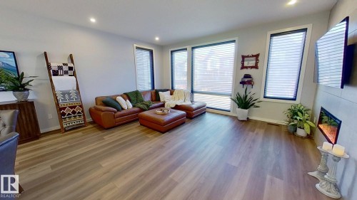 42 1304 Rutherford Road, Edmonton, AB - Indoor Photo Showing Living Room