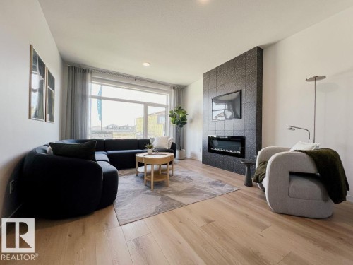 5100 Parc Reunis Way, Beaumont, AB - Indoor Photo Showing Living Room With Fireplace