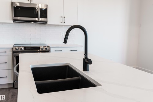 1067 Cornerstone Way, Sherwood Park, AB - Indoor Photo Showing Kitchen With Double Sink
