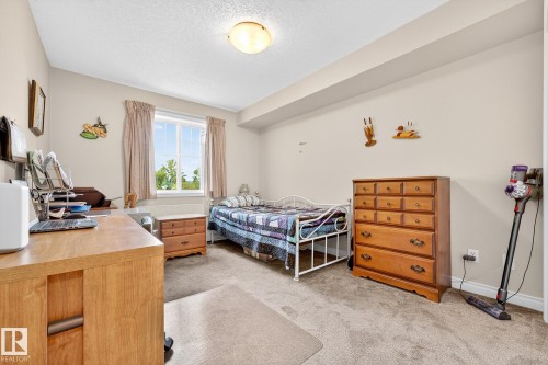 202 9995 93 Avenue, Fort Saskatchewan, AB - Indoor Photo Showing Bedroom