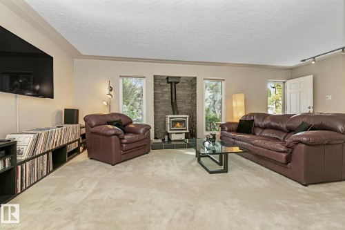 4412 107 Avenue, Edmonton, AB - Indoor Photo Showing Living Room With Fireplace