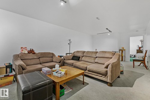 4412 107 Avenue, Edmonton, AB - Indoor Photo Showing Living Room