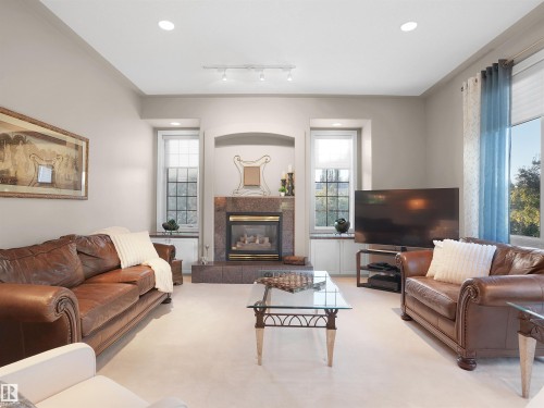 255 Wilson Lane, Edmonton, AB - Indoor Photo Showing Living Room With Fireplace