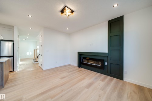 20 Blackbird Bend, Fort Saskatchewan, AB - Indoor Photo Showing Living Room With Fireplace