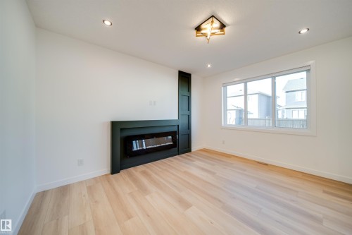 20 Blackbird Bend, Fort Saskatchewan, AB - Indoor Photo Showing Living Room With Fireplace