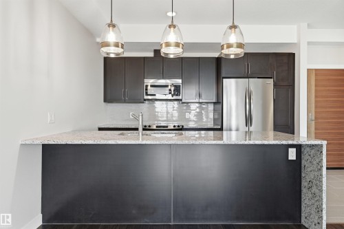 413 625 Leger Way, Edmonton, AB - Indoor Photo Showing Kitchen With Upgraded Kitchen