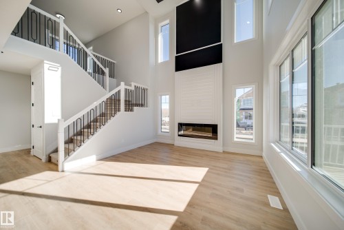 8511 183 Avenue, Edmonton, AB - Indoor Photo Showing Other Room With Fireplace