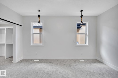 24 104 Allard Link, Edmonton, AB - Indoor Photo Showing Other Room