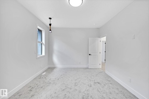 24 104 Allard Link, Edmonton, AB - Indoor Photo Showing Other Room