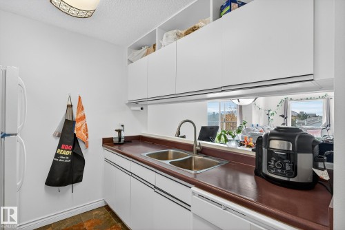402 9620 174 Street, Edmonton, AB - Indoor Photo Showing Kitchen With Double Sink