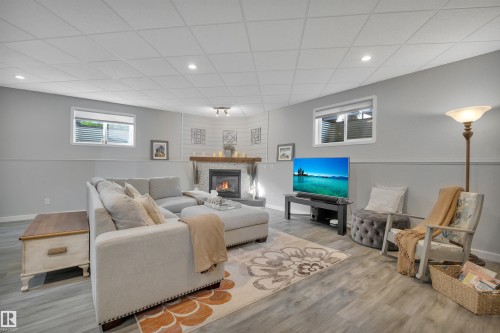 254 Pipestone Close, Millet, AB - Indoor With Fireplace