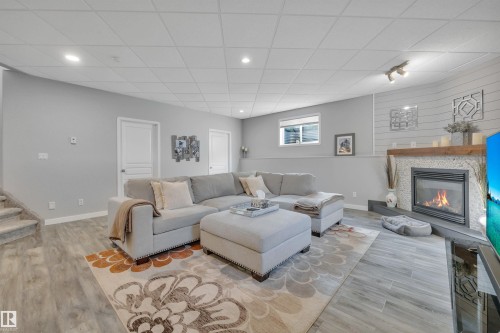 254 Pipestone Close, Millet, AB - Indoor With Fireplace