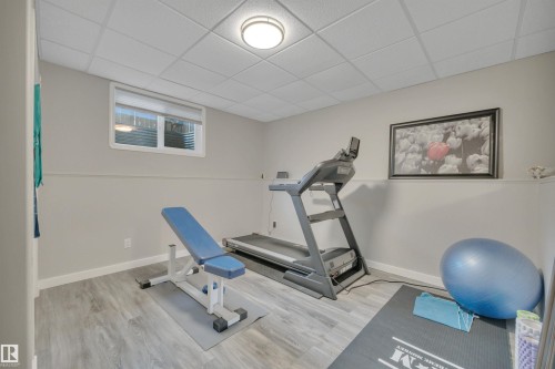 254 Pipestone Close, Millet, AB - Indoor Photo Showing Gym Room