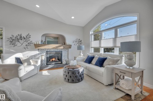 254 Pipestone Close, Millet, AB - Indoor Photo Showing Living Room With Fireplace