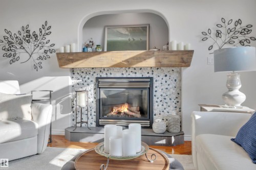 254 Pipestone Close, Millet, AB - Indoor Photo Showing Living Room With Fireplace