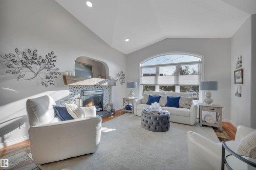 254 Pipestone Close, Millet, AB - Indoor Photo Showing Living Room With Fireplace